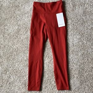 NWT lululemon 25” wunder under train tight with pockets- cayenne. Size 6